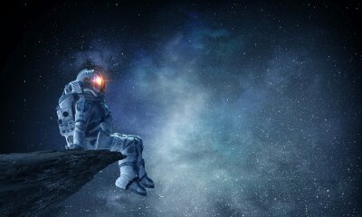 Astronaut am Felsen