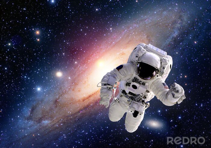 Bild Astronaut im Weltraum vor dem Hintergrund einer Galaxie