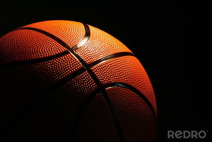 Bild Baskettball auf schwarem Hintergrund