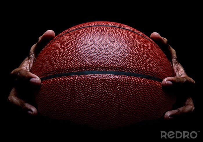 Bild Baskettball Ball in Händen