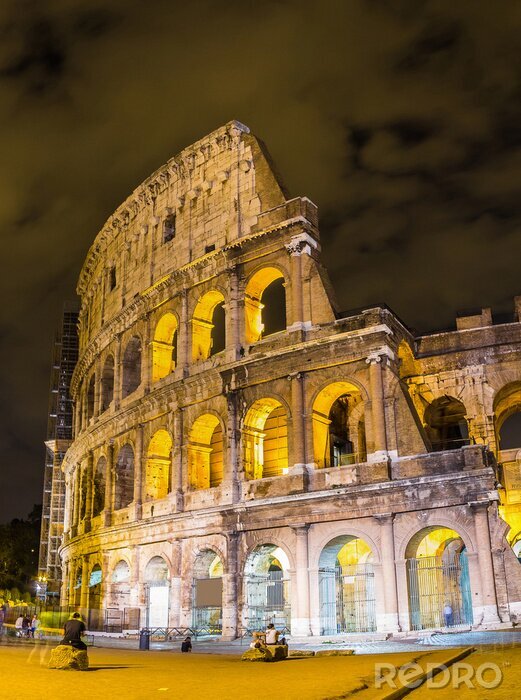 Bild Beleuchtetes Kolosseum bei Nacht in Rom