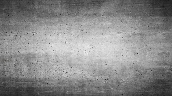 Bild Betonwand mit kleinen Löchern