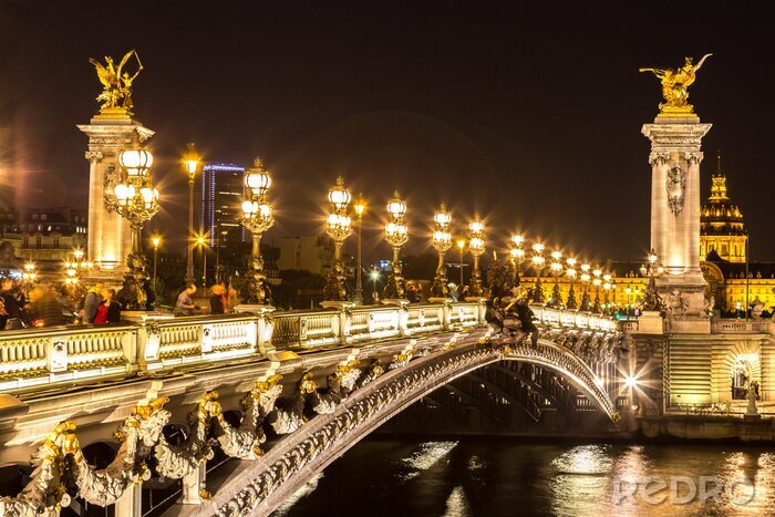 Bild Brücke und Paris bei Nacht