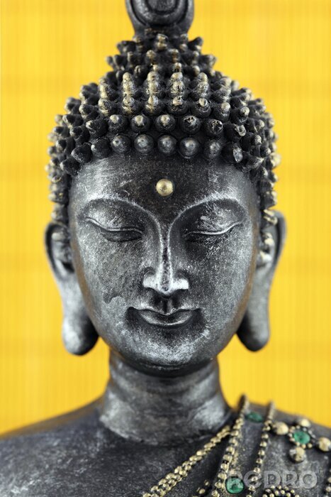 Bild Buddha-Statue auf gelbem Hintergrund