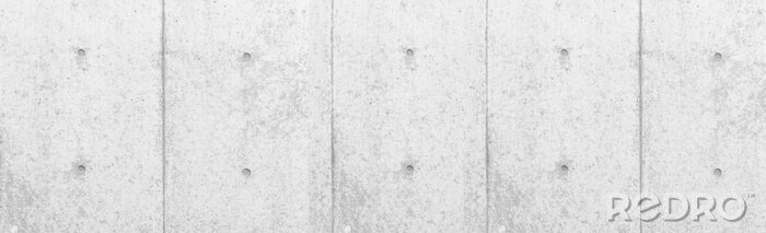 Bild Eine Wand aus vertikalen Betonplatten