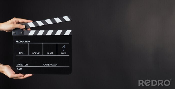 Bild Filmklappe auf schwarzem Hintergrund