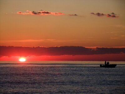 Fischer bei Sonnenuntergang