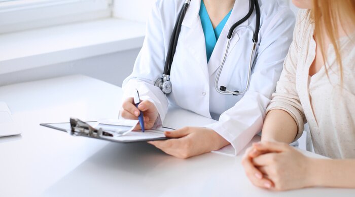 Bild Gespräch mit einem Patienten über Gesundheit