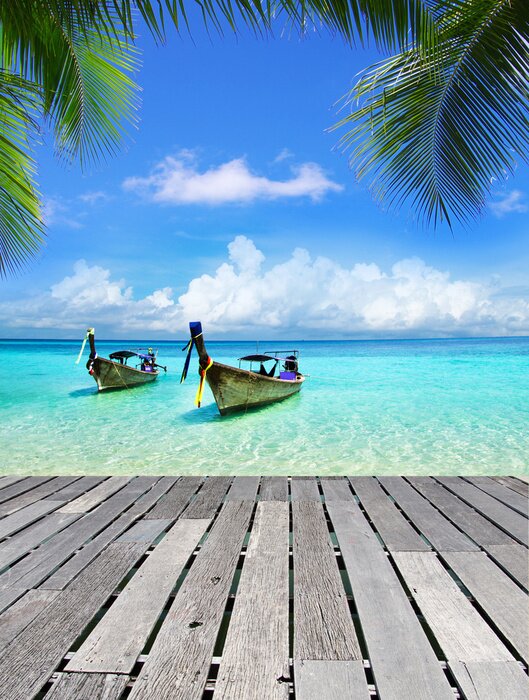 Bild Holzsteg Boote und tropisches Meer