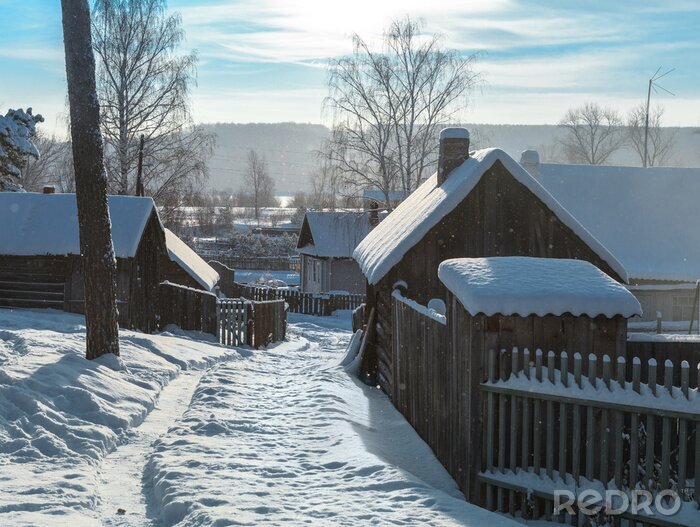 Bild Hütte im Winter mit Schnee bedeckt