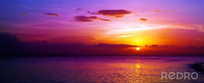 Bild In violetten Tönen Sonnenuntergang am Meer
