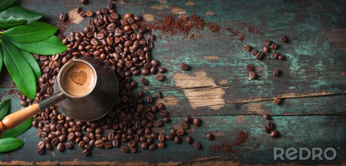 Bild Kaffeebohnen und Kaffeekanne mit langem Griff