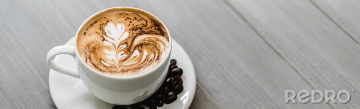 Bild Kaffeetasse mit dekoriertem Schaum