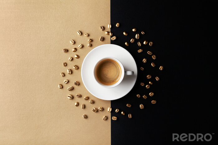 Bild Kaffeetasse und goldene Bohnen