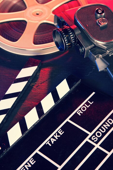 Bild Kino aufspritzen und Rolle auf schwarzem Stein