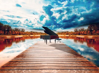 Klavier auf einem Steg am Wasser