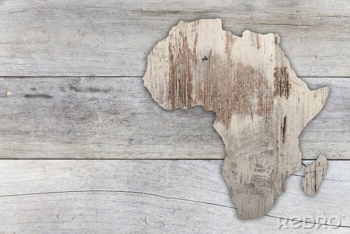 Bild Konturen Afrikas am Holzhintergrund