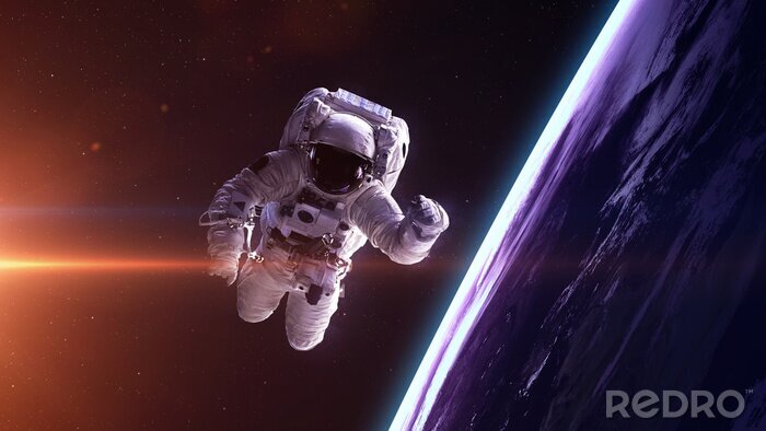 Bild Kosmonaut vor dem Hintergrund des Planeten Erde