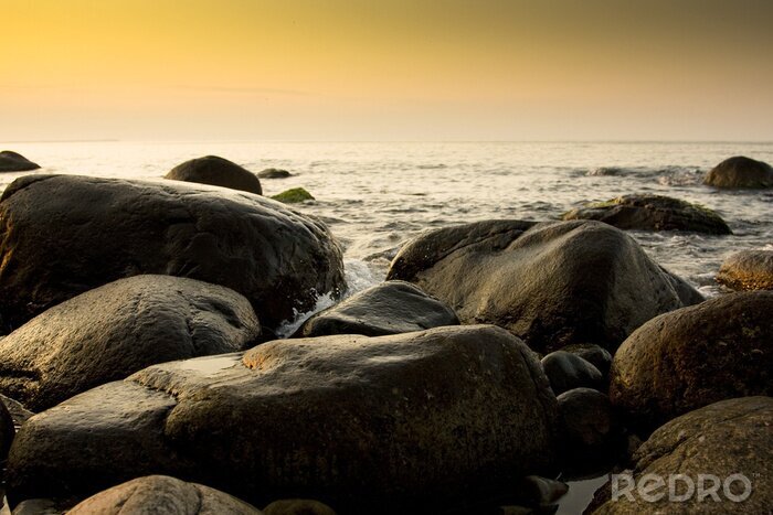 Bild Landschaft mit Steinen an der Küste