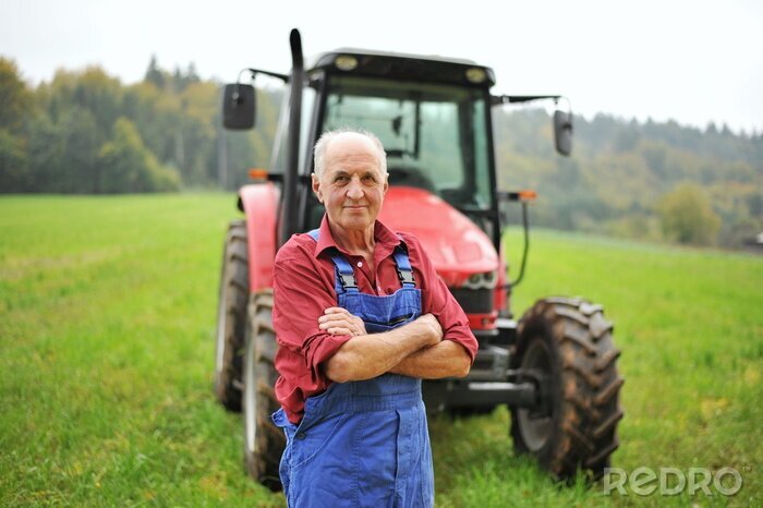 Bild Landwirt und roter Traktor