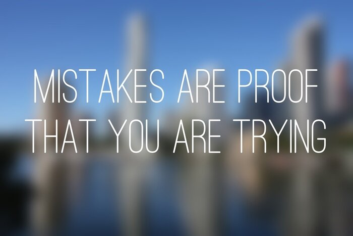 Bild Motivierende Aufschrift vor dem Hintergrund der Wolkenkratzer