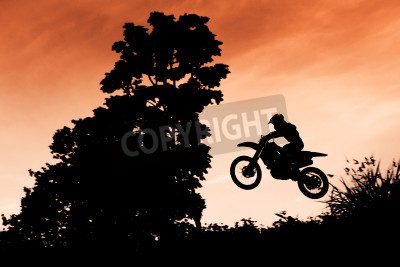 Bild Motocross-Springen bei Sonnenuntergang