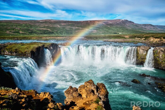 Bild Regenbogen über Wasserfall