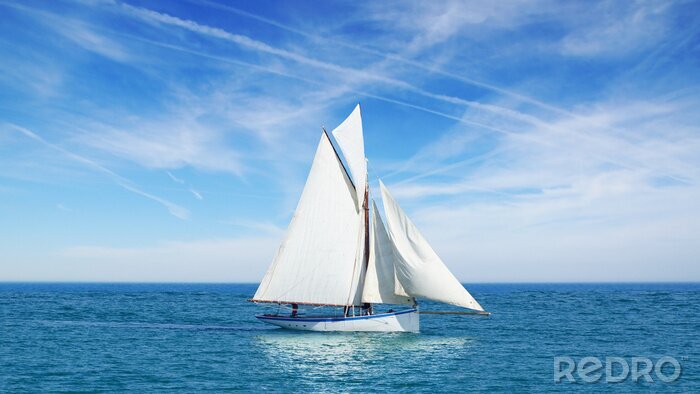 Bild Segelboot vor dem Hintergrund des blauen Himmels