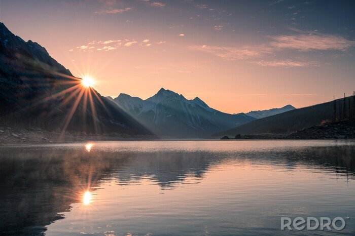 Bild Sonnenaufgang am nebligen See