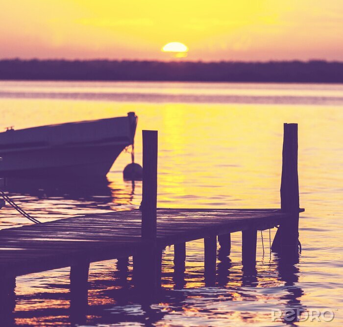 Bild Sonnenuntergang Steg und Boot
