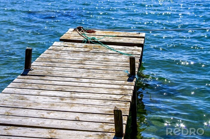 Bild Steg über flimmerndem Wasser