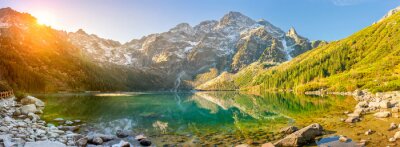 Bild Tatra National Park, a lake in the mountains at the dawn of the sun. Poland