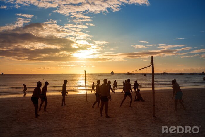 Bild Volleyball Spieler beim Sonnenuntergang