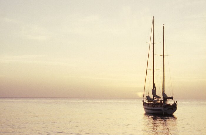 Fototapete Abendhimmel und Segelboot