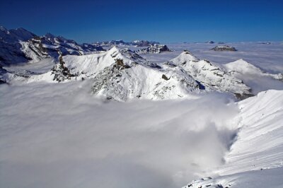 Fototapete Alpengipfel in den Wolken