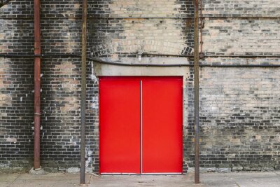 Fototapete Altes Gebäude mit roten Türen