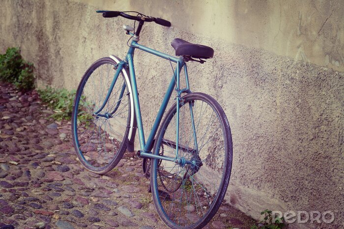 Fototapete An der Wand stehendes Retro-Fahrrad