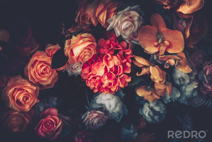 Fototapete Artificial Flowers Wall for Background in vintage style