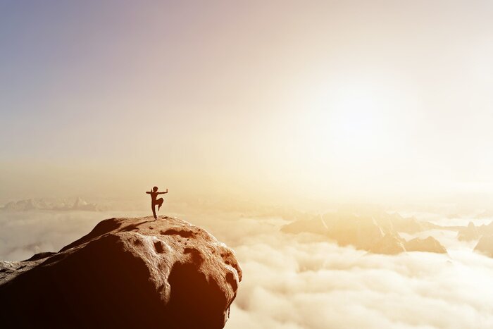 Fototapete Asian man, fighter practices martial arts in high mountains