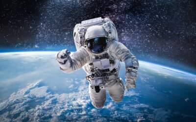 Fototapete Astronaut über dem Planeten Erde