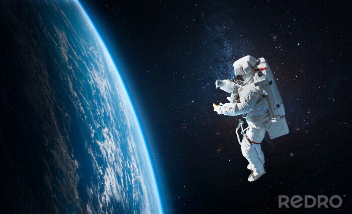 Fototapete Astronaut Weltraum blaue Erdkugel