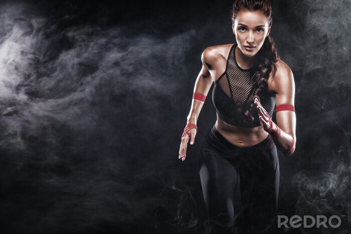 Fototapete Athletische Frau beim Laufen