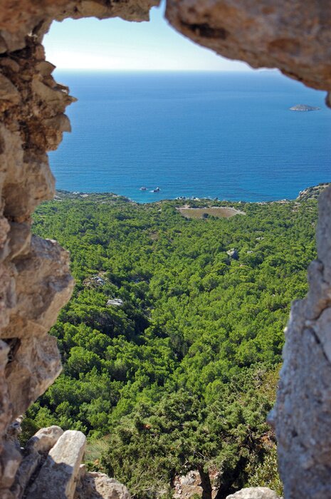 Fototapete Ausblick durch stein auf meer