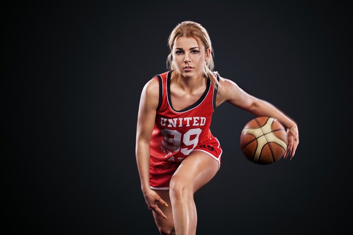 Fototapete Basketballspielerin mit Ball