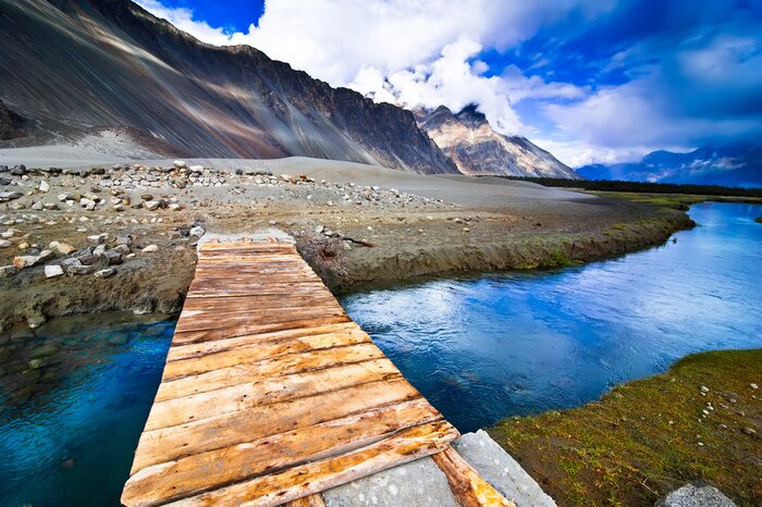 Fototapete Berglandschaft mit blauem Himmel