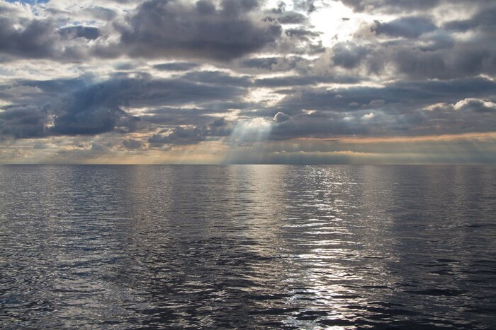 Fototapete Bewölkter Himmel am Meer