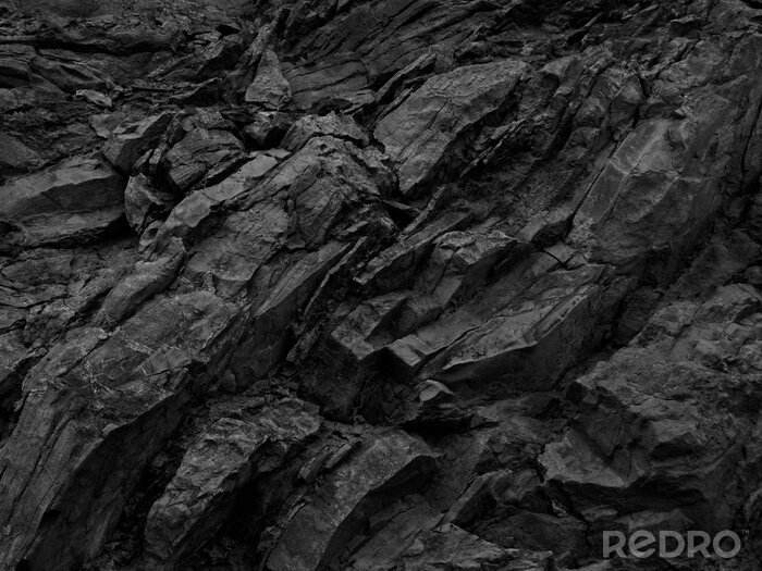 Fototapete Black rock background. Dark gray stone texture. Black grunge background. Mountain close-up. Distressed backdrop.