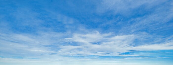 Fototapete Blauer Himmel mit weißen Wolken