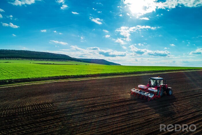 Fototapete Blick aus der Luft auf Traktor und Feld