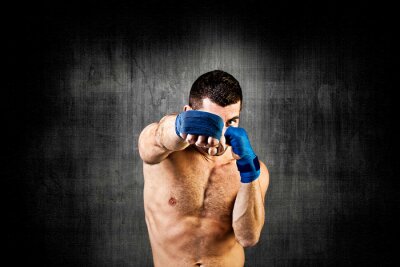 Fototapete Boxer vor dem Hintergrund der Betonwand